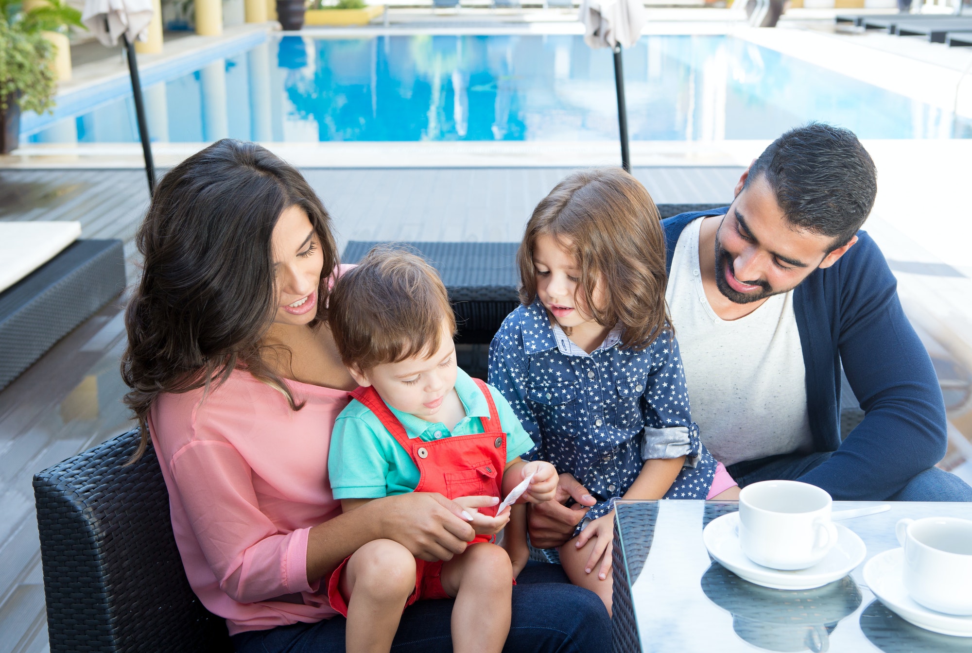 Family close to the pool